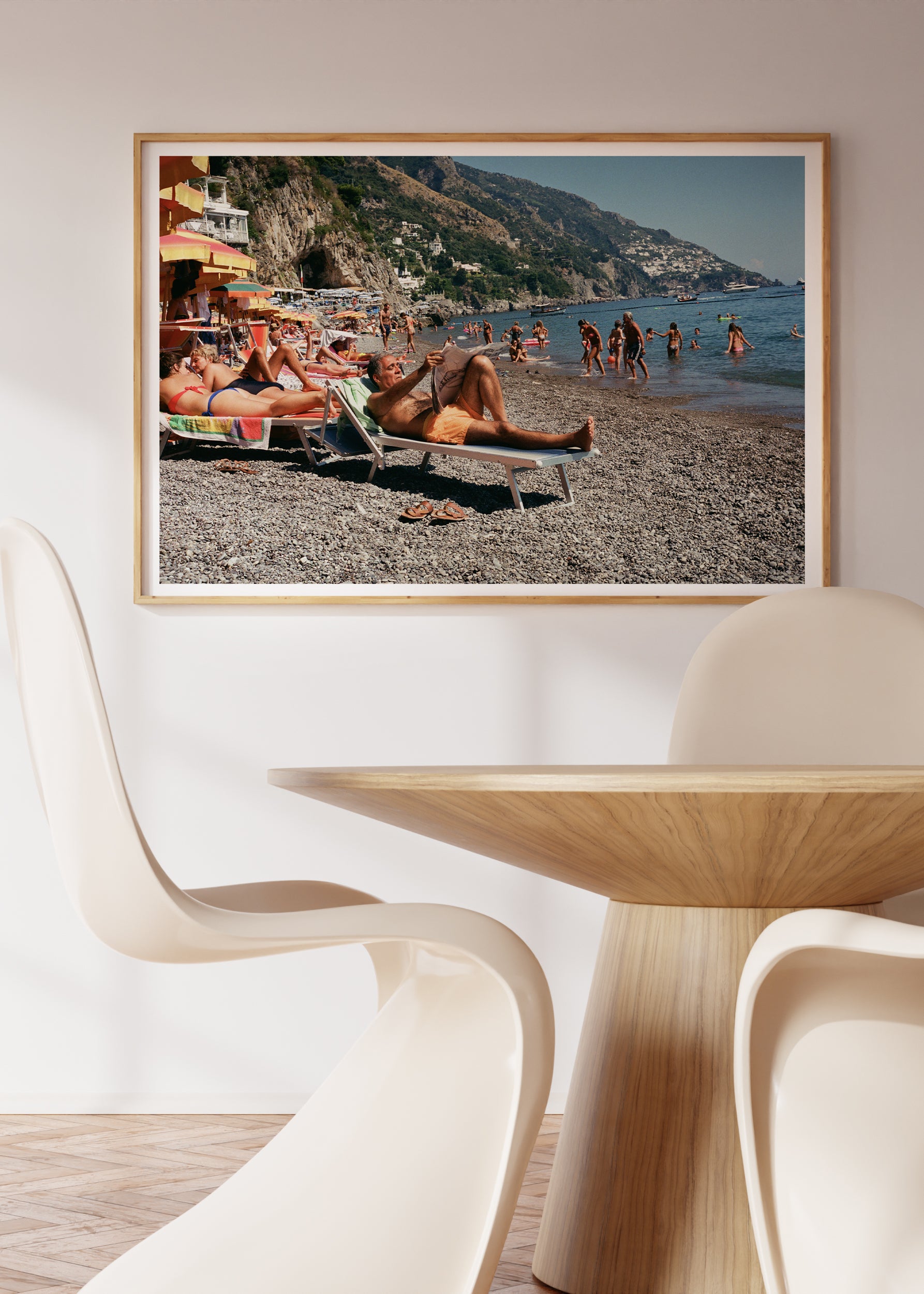 Sara's 'Dolce Far Niente' print framed in an aesthetic dining room.
