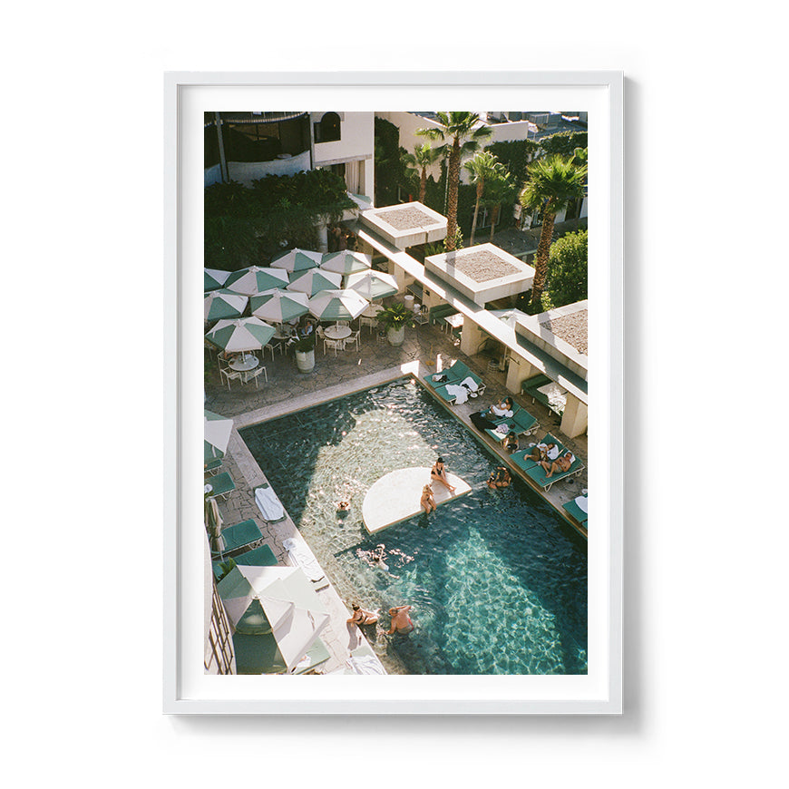 Sara's 'Calile Hotel' print framed in a white timber frame.