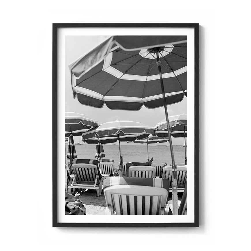 Sara's 'Antibes' print framed in a black timber frame.
