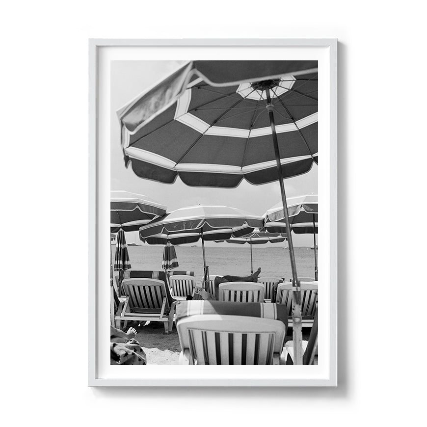 Sara's 'Antibes' print framed in a white timber frame.