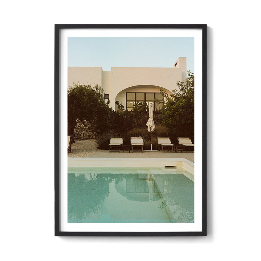 Sara's 'Puglia Dream' print framed in a black timber frame.