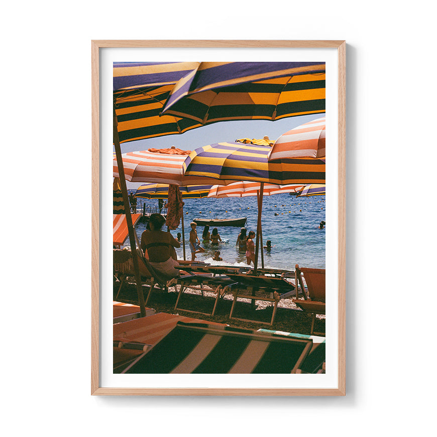 Sara's 'Capri Heat' print framed in an oak timber frame.