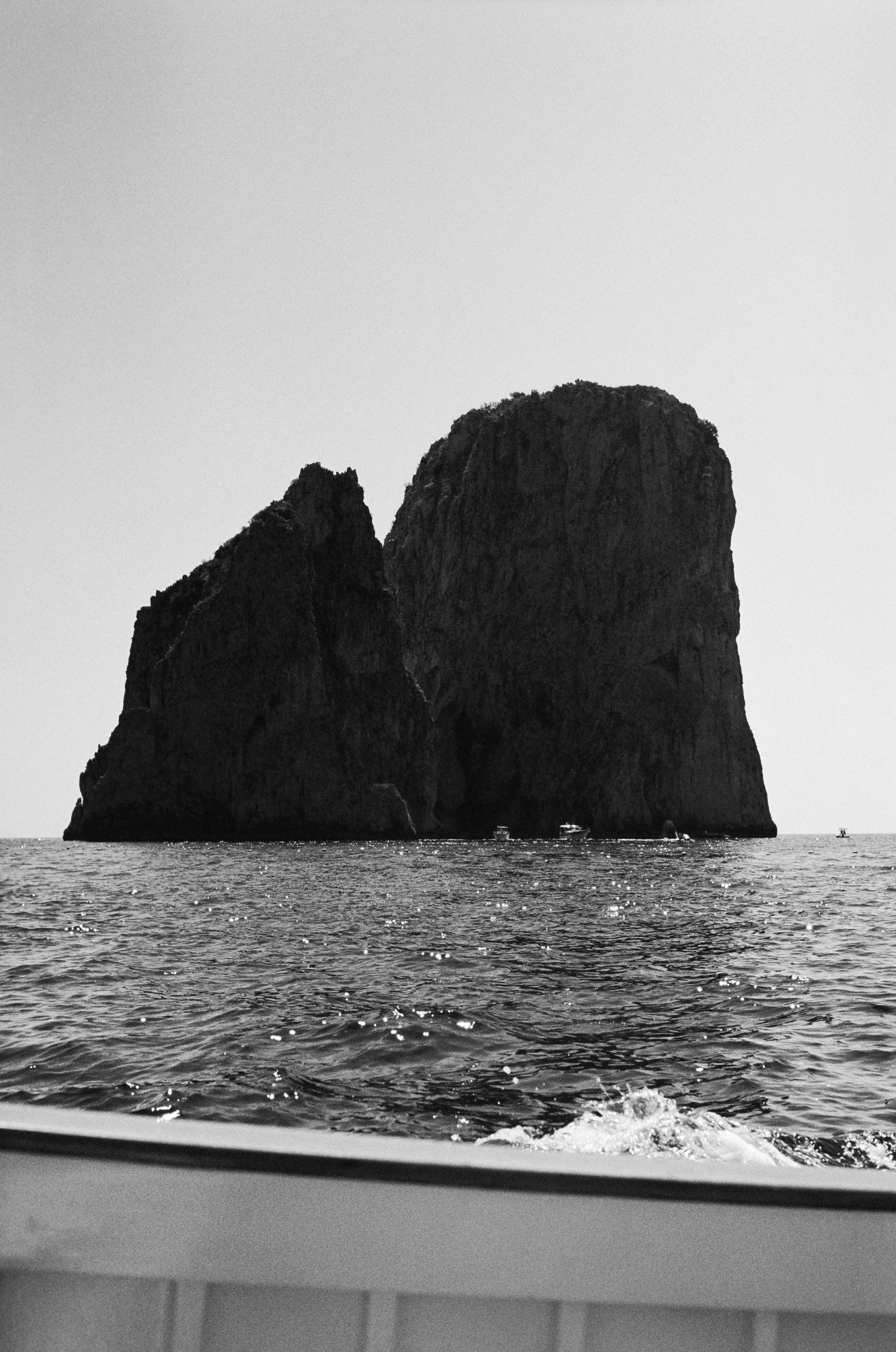 FARAGLIONI BY BOAT