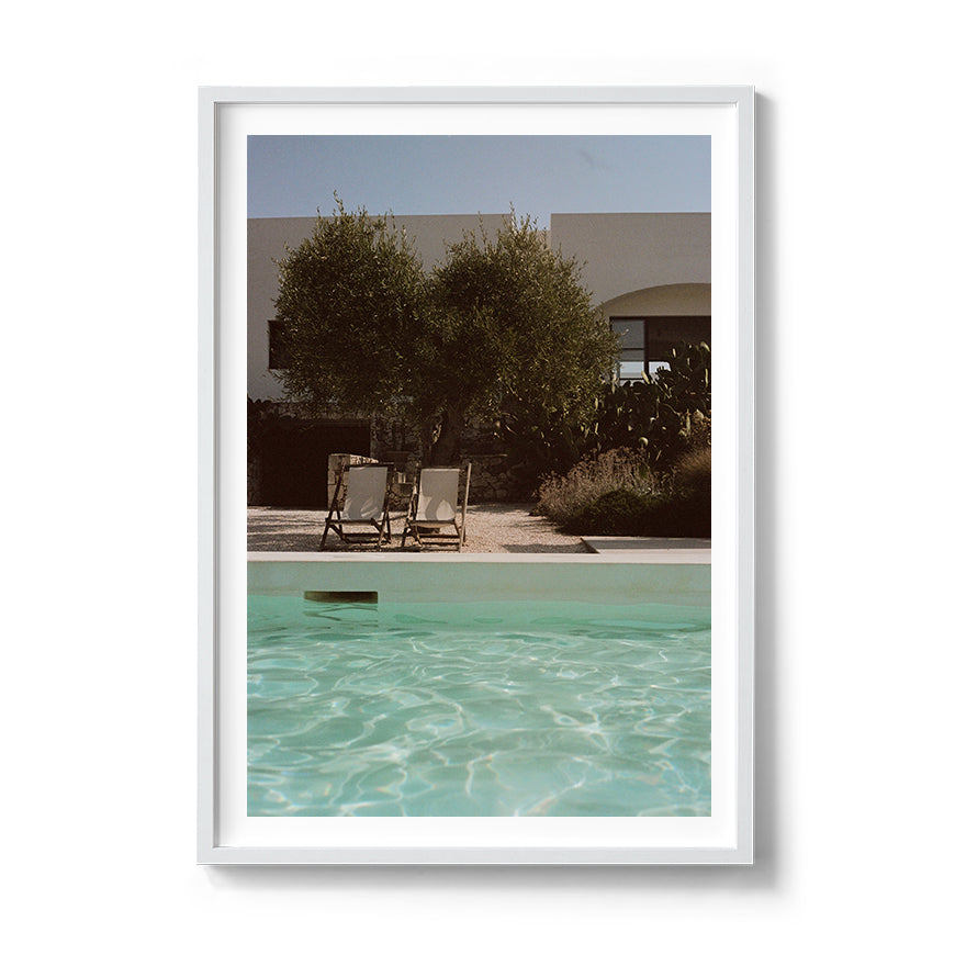 Sara's 'La Piscina' print framed in a white timber frame.