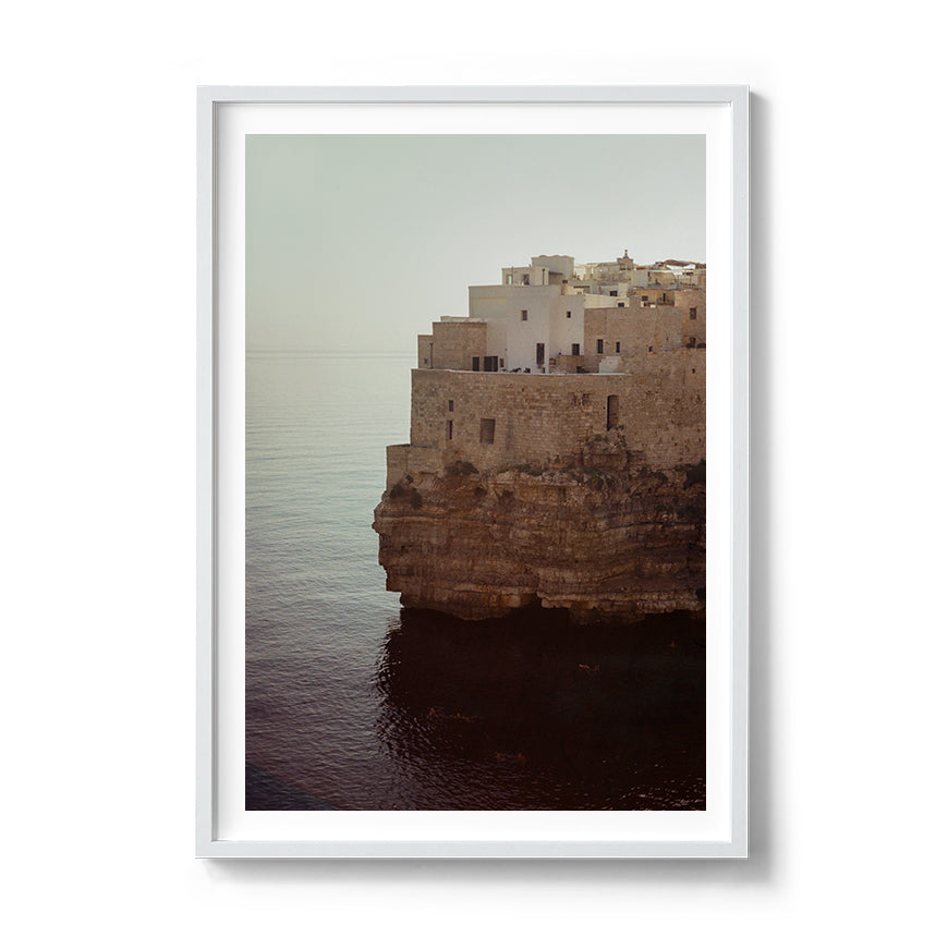 Sara's 'Polignano A Mare' print framed in a white timber frame.