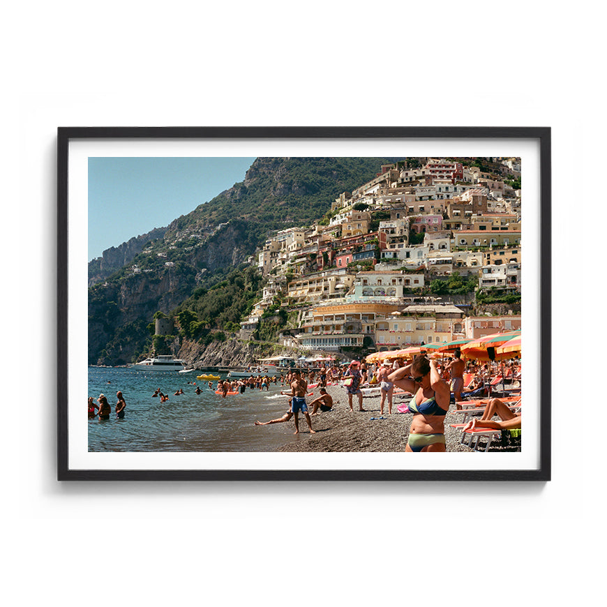 Sara's 'Life. Positano' print framed in a black timber frame.