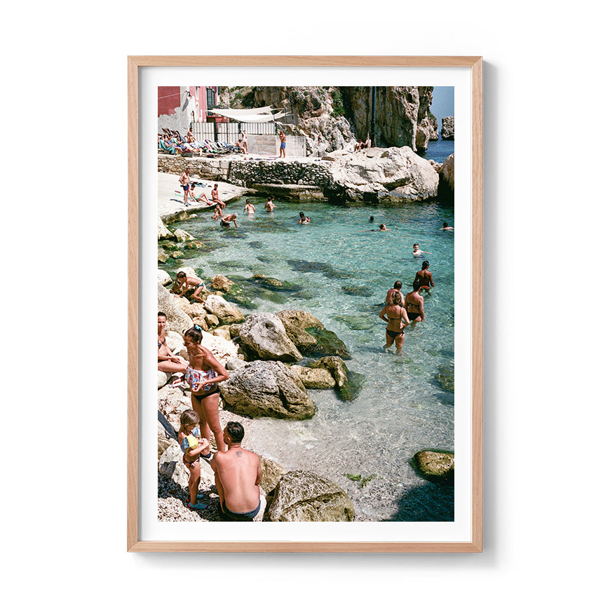 Sara's 'Sicilian Swimming Hole' print framed in an oak timber frame.