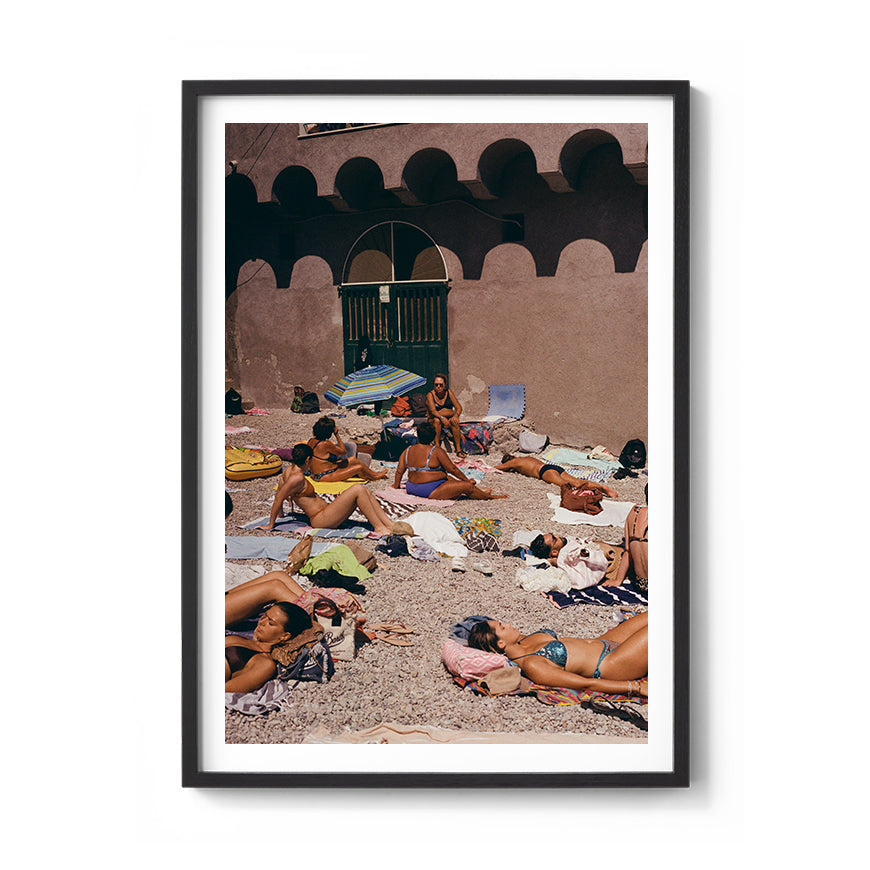Sara's 'Sunbathe' print in a black timber frame.