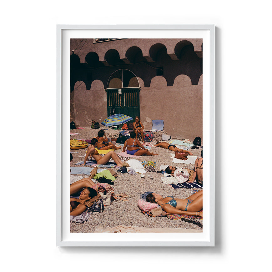 Sara's 'Sunbathe' print in a white timber frame.